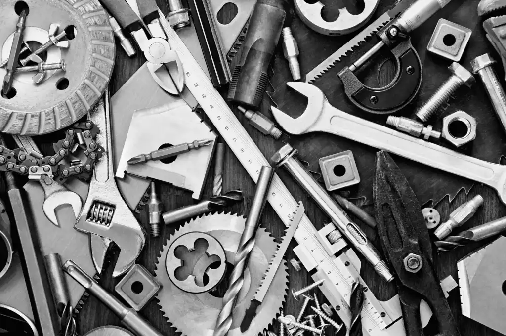 A better way to work with SQL Server shutterstock 175644863 scattered clutter of nuts bolts wrenches tools in black and white
