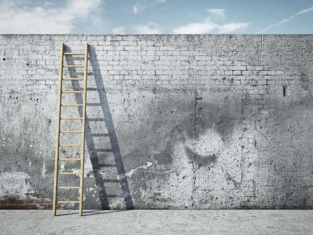 The new AI lock-in | InfoWorld shutterstock 120020251 ladder on wall in front of blue sky white clouds